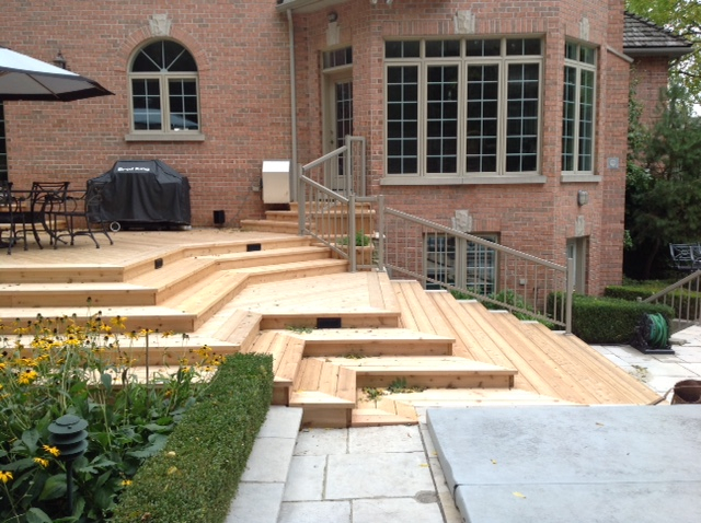 Custom multi-tiered deck built by Deck Dreams